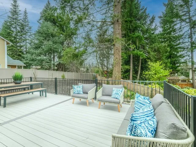 a new backyard deck with outdoor furniture